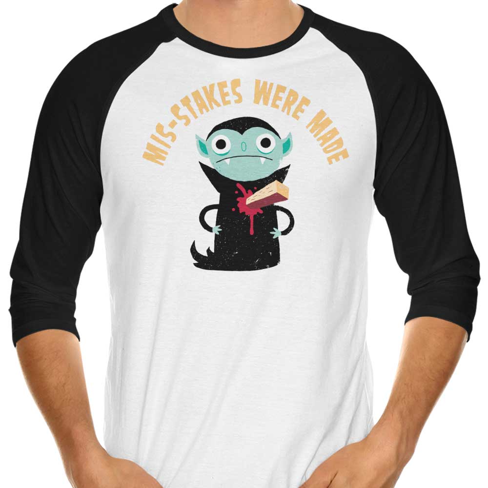 3/4 Sleeve Raglan T-Shirt Featuring the Phrase 'Mis-Stakes Were Made'