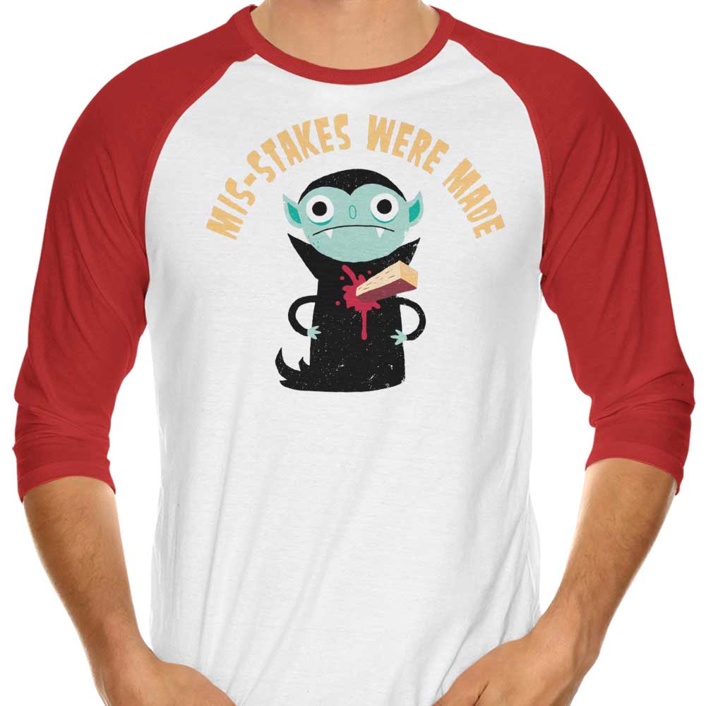 3/4 Sleeve Raglan T-Shirt Featuring the Phrase 'Mis-Stakes Were Made'